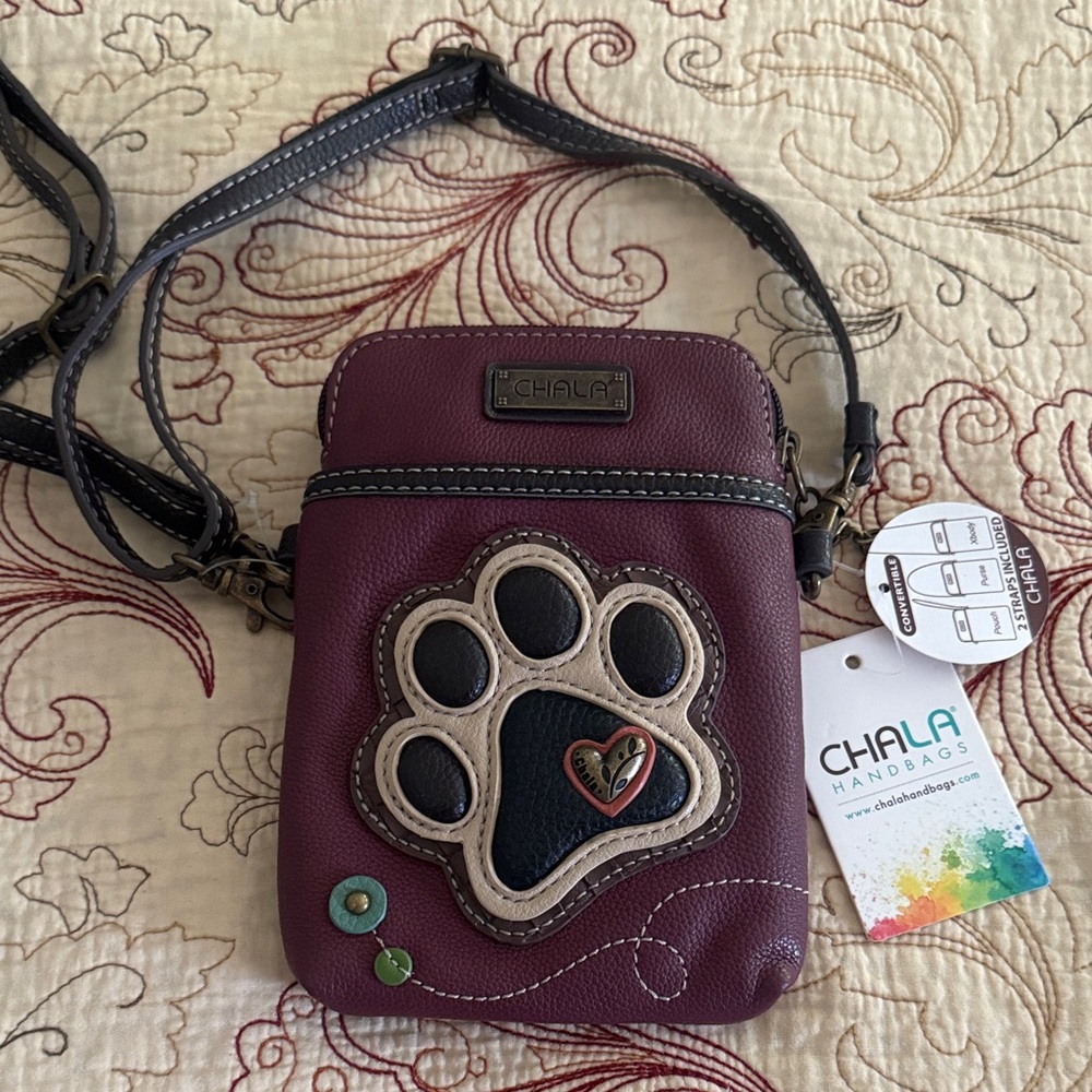 NWT Chala Burgundy Crossbody bag with paw design.